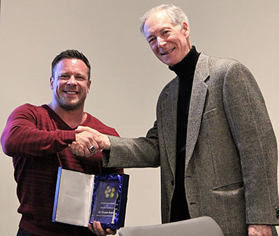 Dr. Shawn Arent Receives 2016 IFNH Director's Award from Director Peter Gillies.